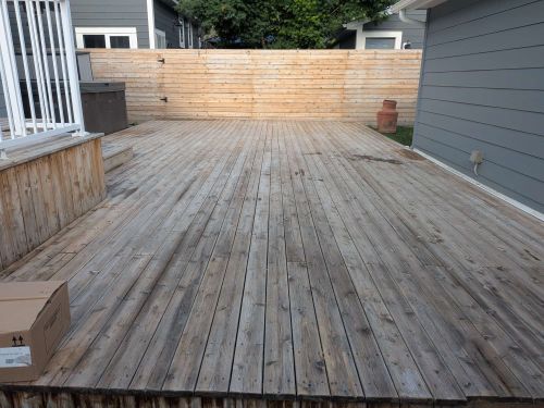 Deck painting in NW Calgary