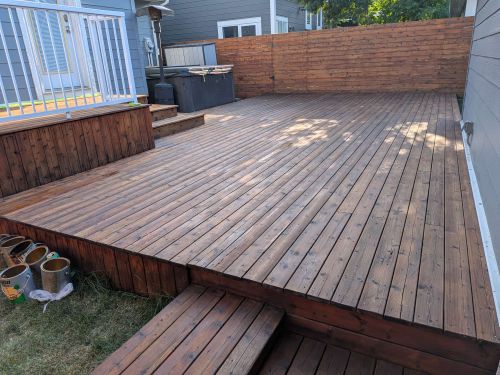 Deck painting in silver springs NW Calgary